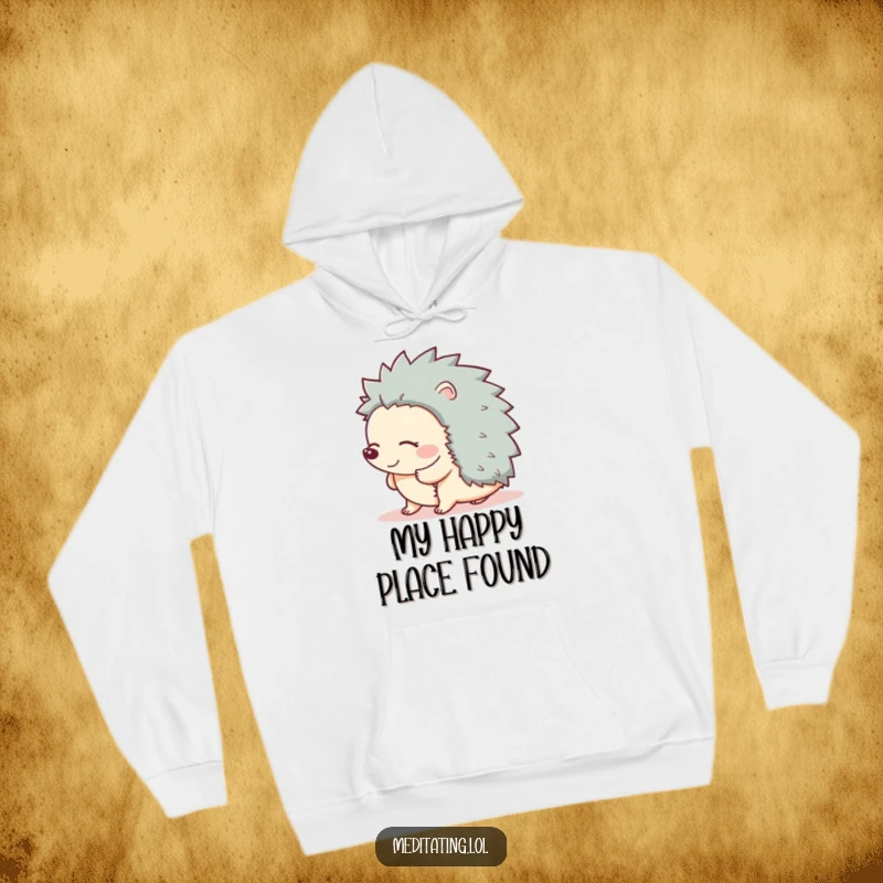 Funny hoodie showcasing a giggling hedgehog in a gentle sway, eyes closed in pure bliss, perfect for cozy smiles.