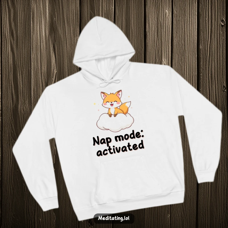 Funny Hoodie with a joyful fox relaxing on a soft cloud cushion, offering comfort and a touch of playful serenity.