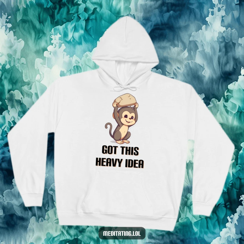 Funny mischievous monkey hoodie, illustration of a primate balancing a rock on its head, perfect for cozy laughs and warmth.