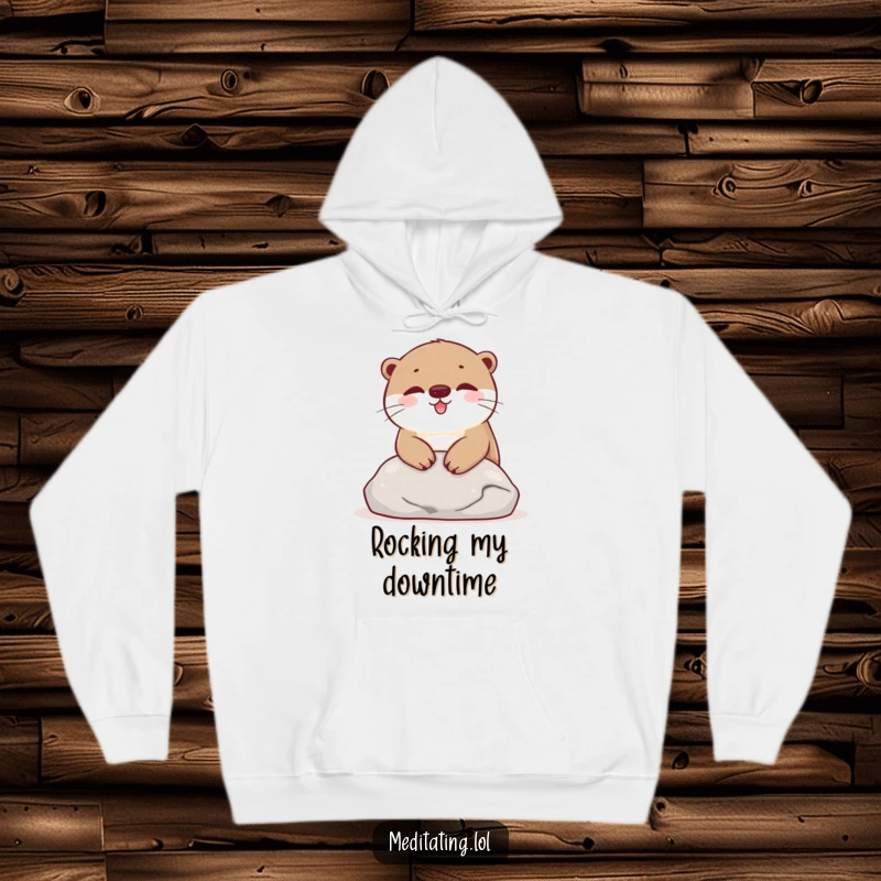 Funny Hoodie featuring a happy otter resting on a smooth stone, offering comfort and a touch of cheerful relaxation.