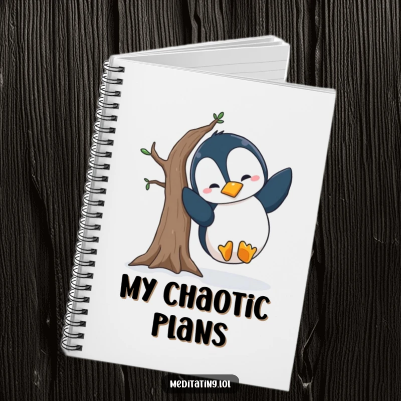 Funny penguin notebook with lined pages, depicting a silly penguin falling out of a wobbly tree pose, perfect for journaling and a fun gift.