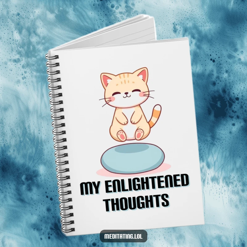 Funny Notebook: A cute cat levitating slightly above a meditation cushion, perfect for jotting down ideas with humorous serenity.