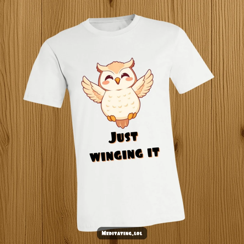 Funny Owl T-Shirt: A joyful owl striking a graceful meditative pose, designed for ultimate comfort and humor.