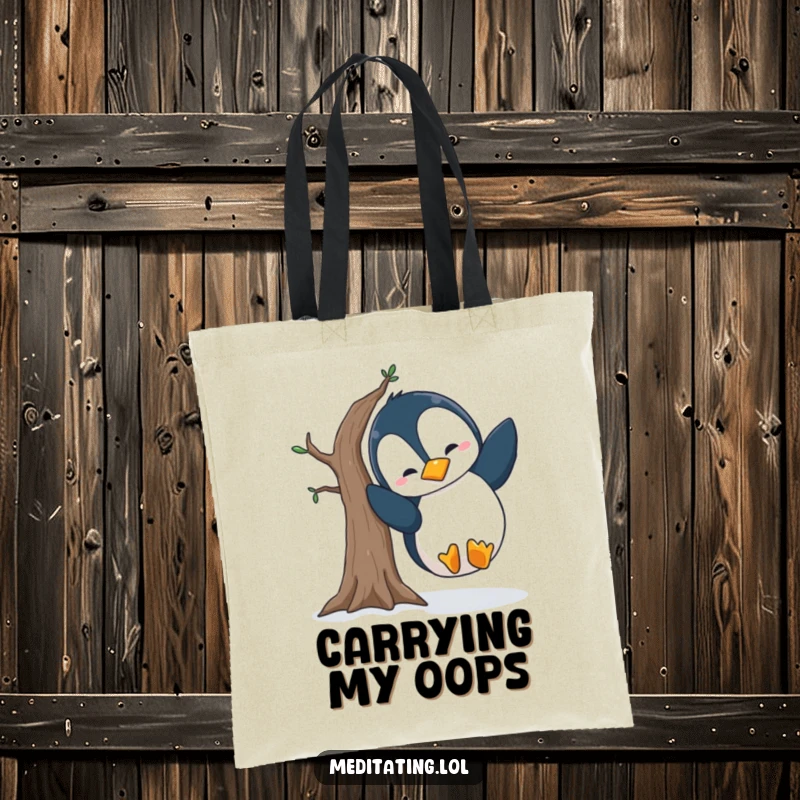 Funny penguin tote bag depicting a silly penguin hilariously falling over while attempting a wobbly tree pose, ideal for carrying essentials.